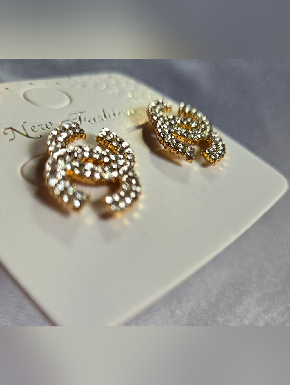 Gold-Tone Crystal Interlocking Logo Stud Earrings - Picture 4 of 4